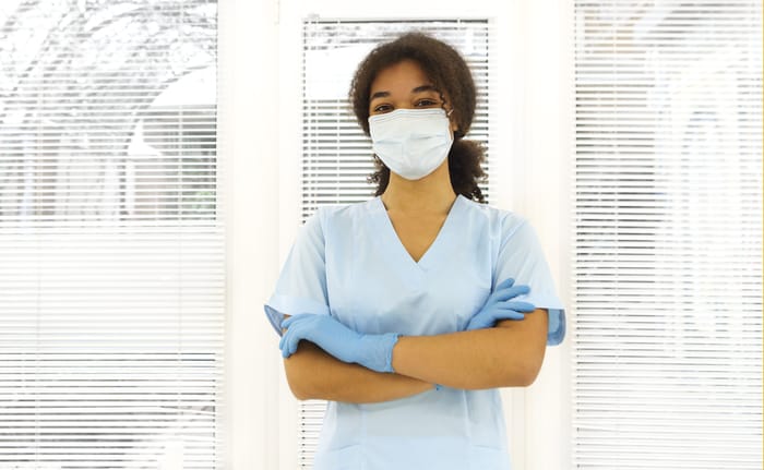 How Travel Nurses Can Avoid Scams When Renting Apartments 1 Travel Nurses Can Avoid Scams - nurse in nose mask
