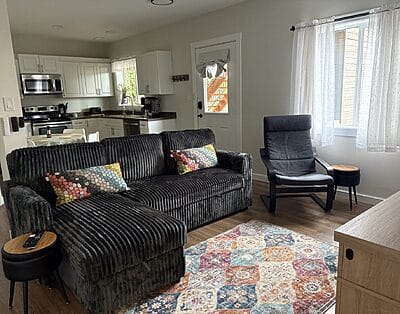 Bright One Bedroom + Den, Ground Level Suite with Private Entrance and Covered Patio