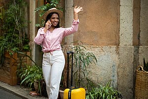 Finding a Home - female smiling holding a phone