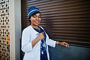 Finding a Home - female smiling holding a phone