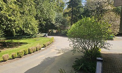 Furnished bedroom and private bathroom in a four bedroom house, on a gated 1.5 acre forested property, close to beaches.
