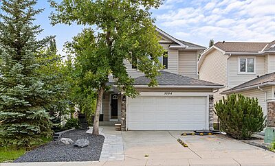 WALKOUT Basement suite w/SEPARATE entrance-Hidden Valley for working professional